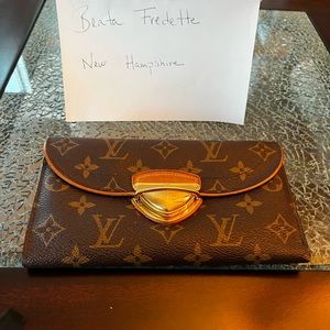 LV Monogram Eugenie Wallet.